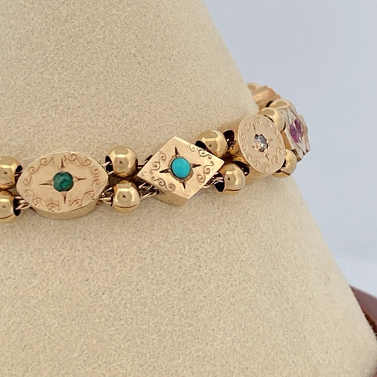 A Rainbow of Memories: Vintage 14k Yellow Gold Slide Charm Bracelet (On Consignment)